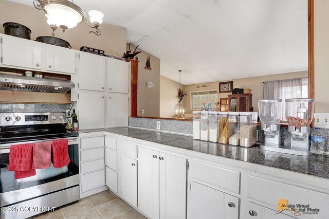 5450 E Alder Dr, Wasilla, AK 99654 - kitchen featuring tile counters, white cabinets, extractor fan, and electric stove