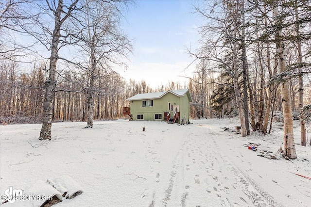 view of yard layered in snow