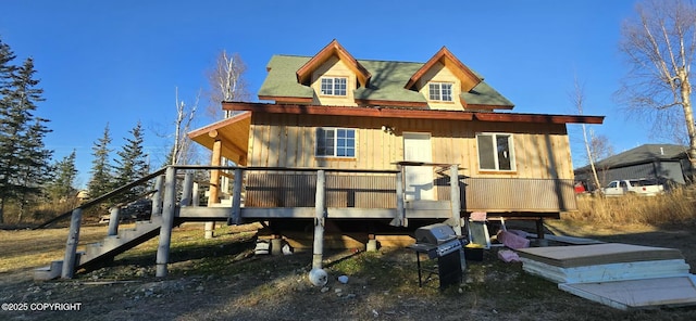 back of property with a deck