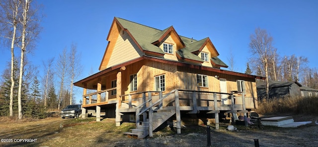 exterior space featuring a wooden deck