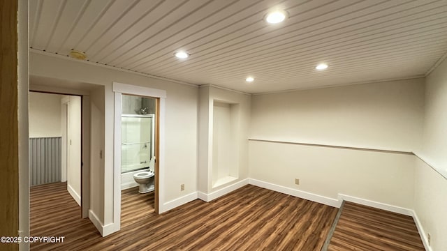 empty room with dark wood-type flooring