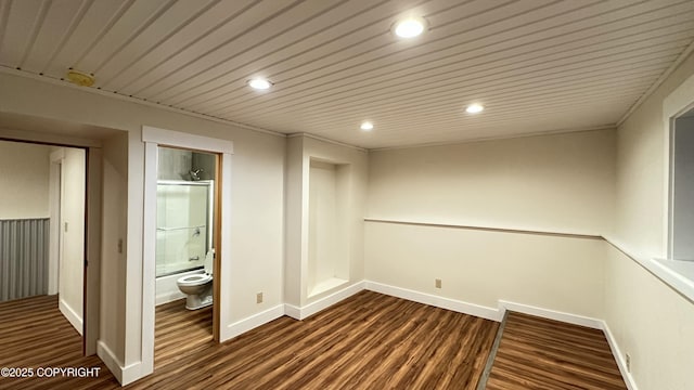 empty room with dark hardwood / wood-style floors