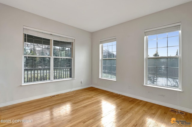 empty room featuring light hardwood / wood-style flooring