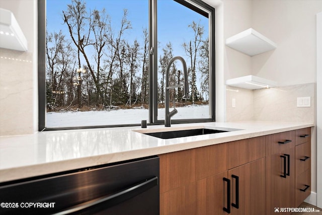 kitchen featuring dishwasher and sink