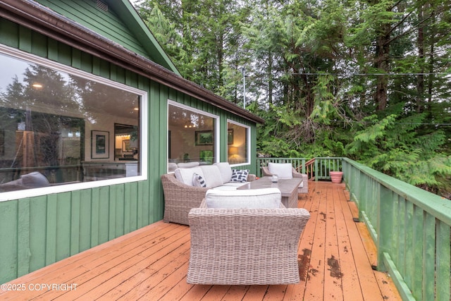 deck featuring outdoor lounge area