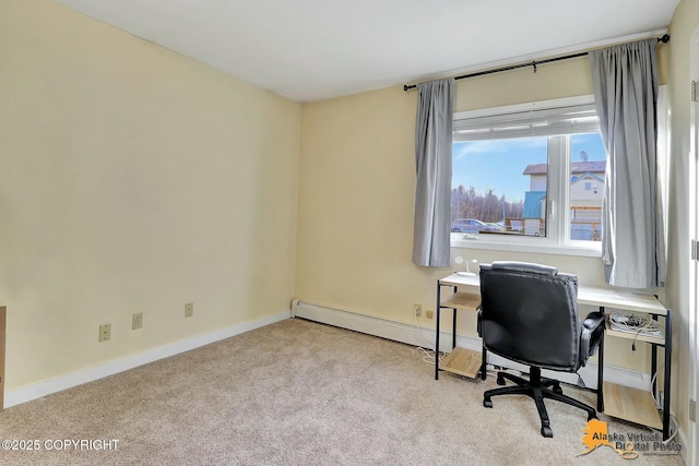 carpeted office space featuring baseboards