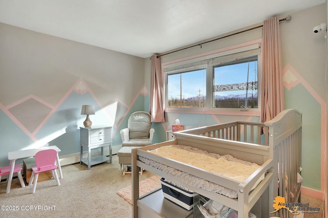 bedroom featuring baseboards and carpet floors