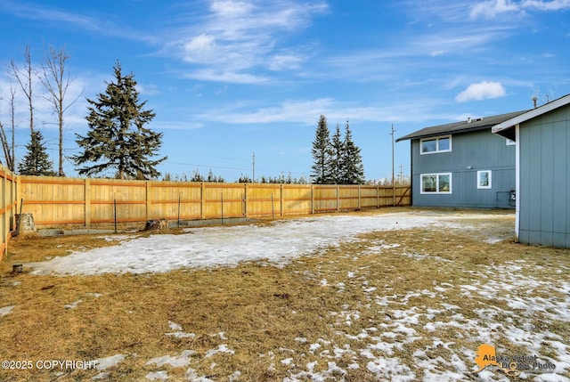 view of yard featuring a fenced backyard