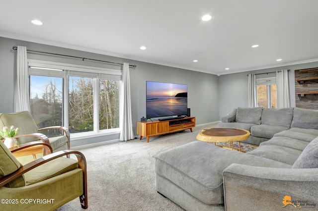 carpeted living area with baseboards, recessed lighting, and crown molding