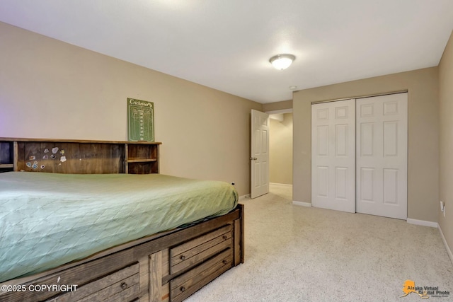 bedroom featuring a closet and baseboards