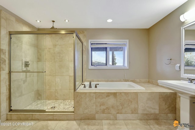 bathroom featuring a stall shower, a garden tub, recessed lighting, and tile patterned floors