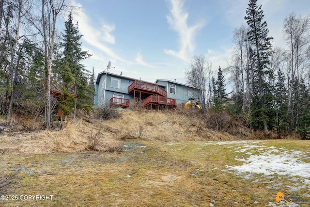 rear view of house with a deck