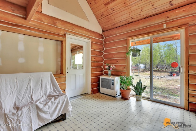 sunroom / solarium with wood ceiling, heating unit, and lofted ceiling