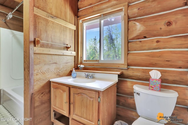 full bathroom featuring tub / shower combination, vanity, and toilet