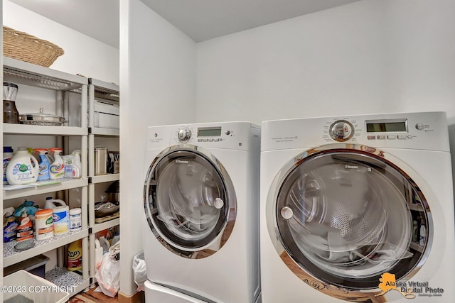 washroom featuring washer and dryer