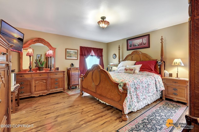 bedroom with light hardwood / wood-style floors