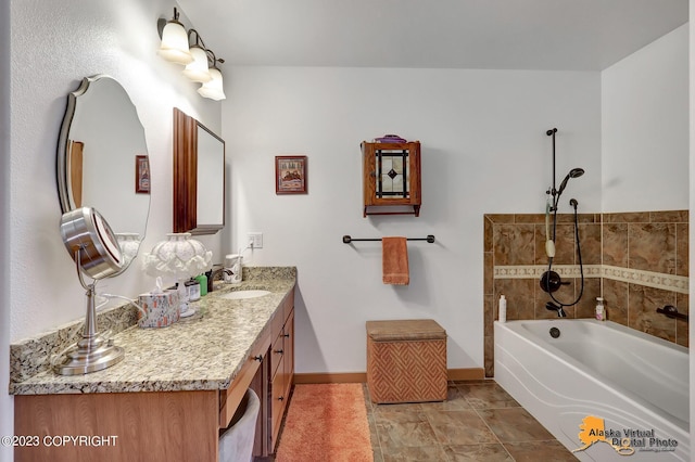 bathroom featuring a bathtub and vanity