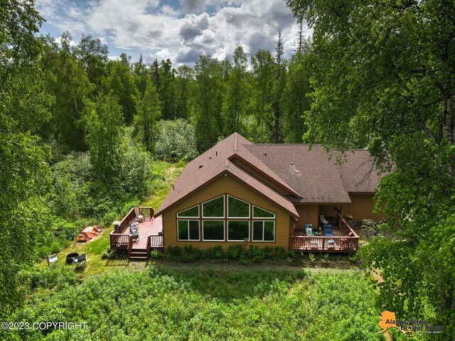 23265 S Jurasek Dr, Trapper Creek, AK 99683 - back of property with a wooden deck