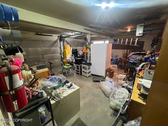 garage with freestanding refrigerator