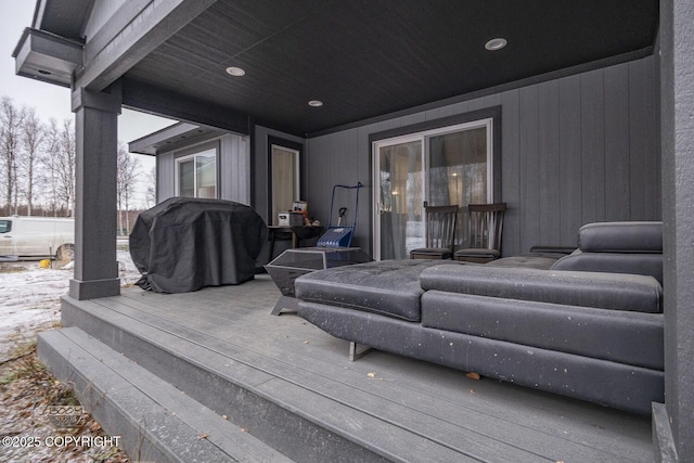 wooden deck with area for grilling