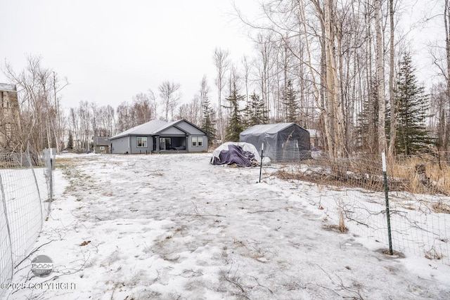 view of yard covered in snow