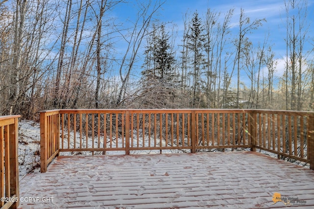 view of snow covered deck