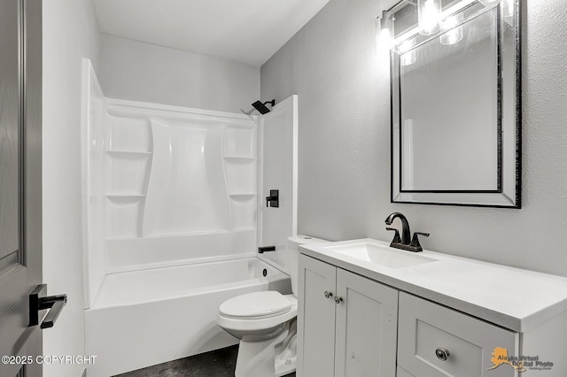 full bathroom with vanity, shower / washtub combination, and toilet