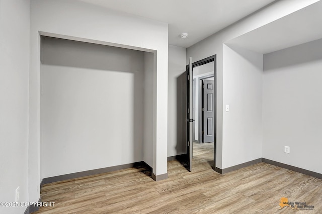 unfurnished bedroom featuring light hardwood / wood-style flooring