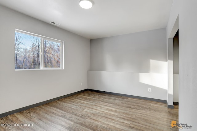 empty room featuring light wood-type flooring