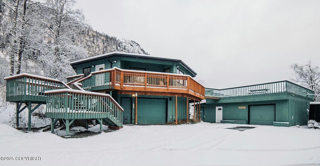 view of front of house with a deck