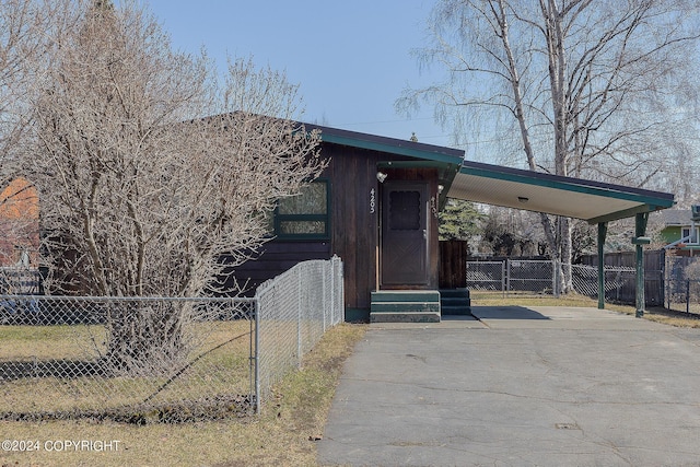 view of front facade with a carport