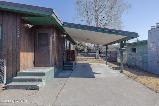 exterior space featuring a carport