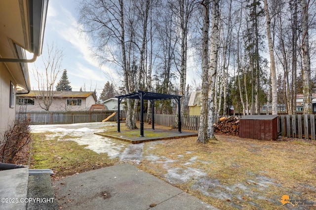 view of yard featuring a patio, a jacuzzi, and a pergola