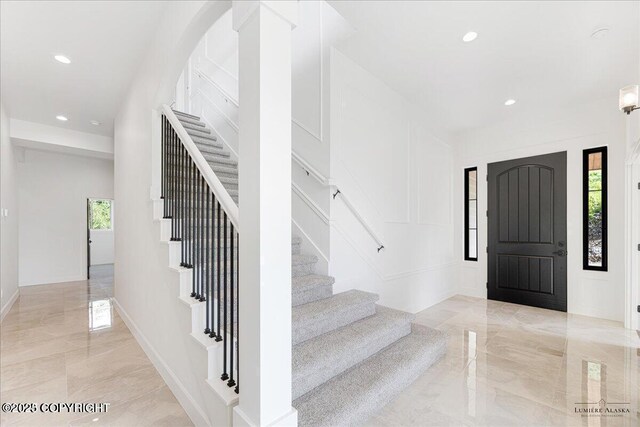 1690 W Valley Ridge Dr, Wasilla, AK 99654 - entrance foyer featuring stairs, light marble finish flooring, and recessed lighting