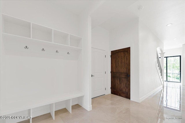 1690 W Valley Ridge Dr, Wasilla, AK 99654 - mudroom with baseboards, recessed lighting, and light marble finish floors