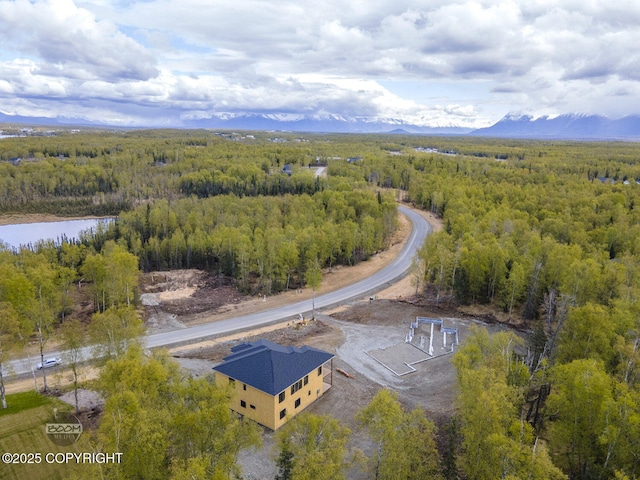 1690 W Valley Ridge Dr, Wasilla, AK 99654 - drone / aerial view of a forest and mountains