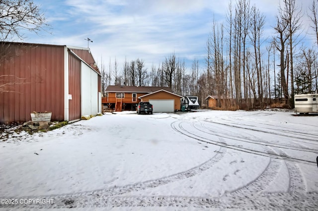 view of yard layered in snow