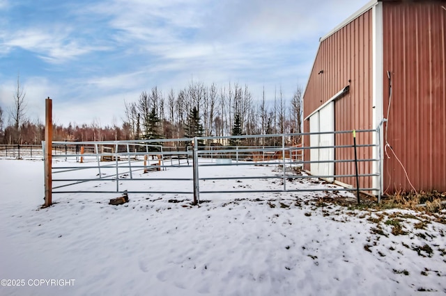 view of yard layered in snow