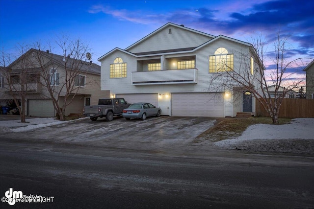 front facade with a garage