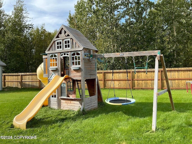 view of playground with a lawn