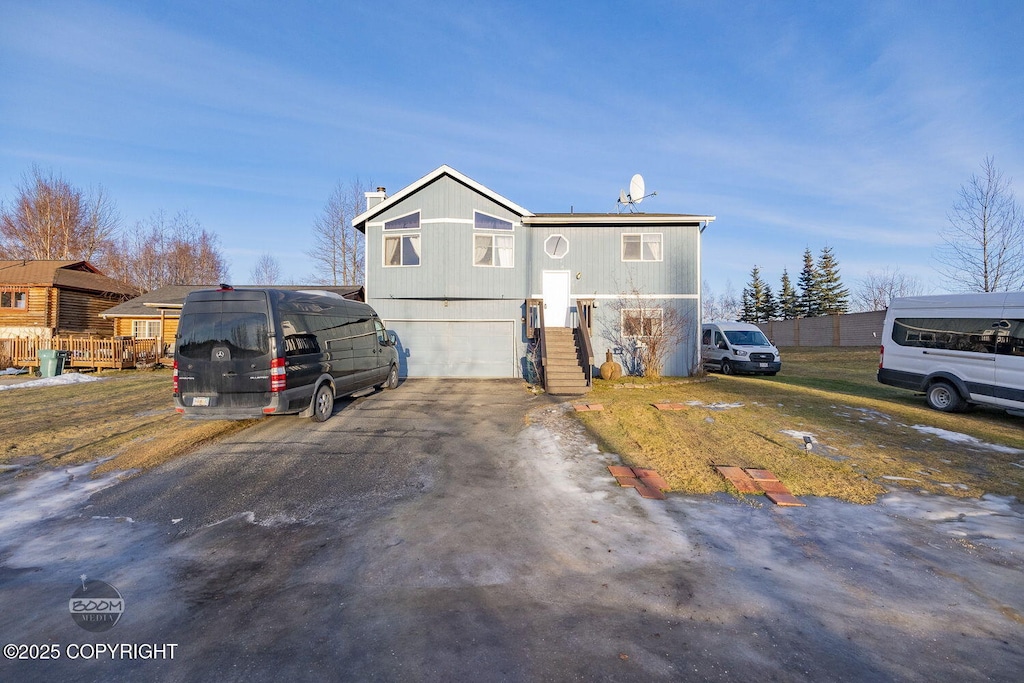 view of front of home with a garage