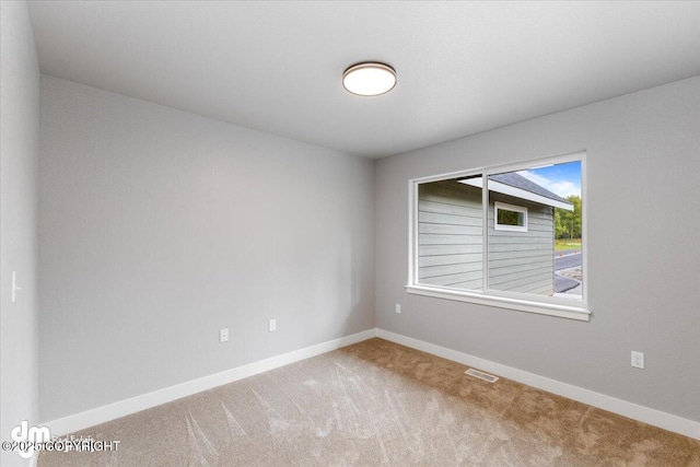 empty room with carpet floors