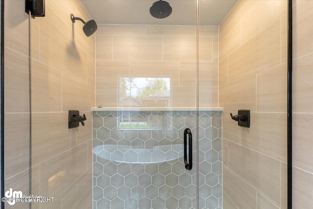 bathroom with an enclosed shower