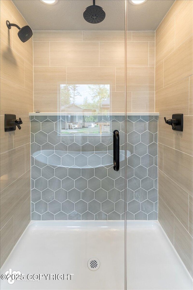 bathroom with an enclosed shower