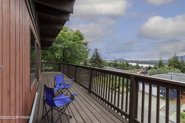 deck featuring a water view