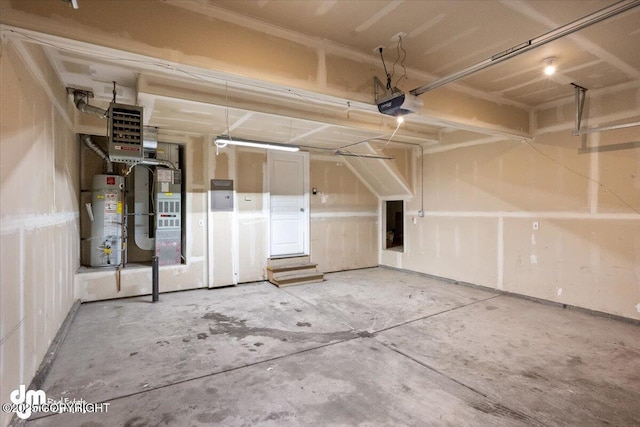 garage featuring heating unit, gas water heater, and a garage door opener