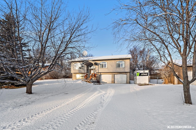 raised ranch with a garage