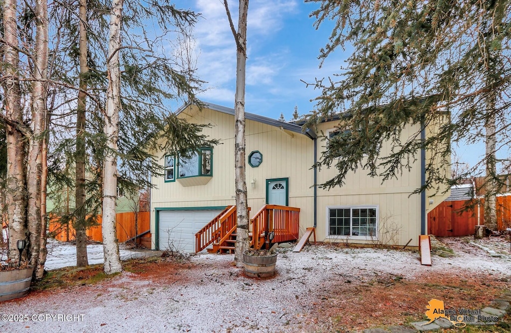 split foyer home featuring a garage