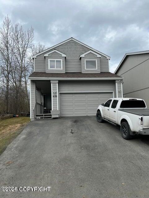 view of front property with a garage