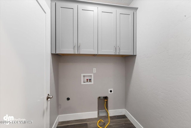 laundry area with cabinets, washer hookup, hookup for an electric dryer, and hardwood / wood-style floors